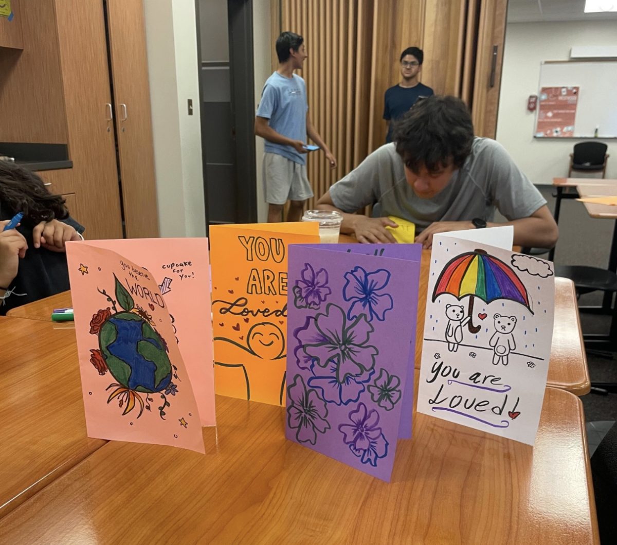 Focused, HOSA member Alan Morillo '26 writes letters for depression patients. Each member wrote two thoughtful letters, decorated fully with their artistic freedom.